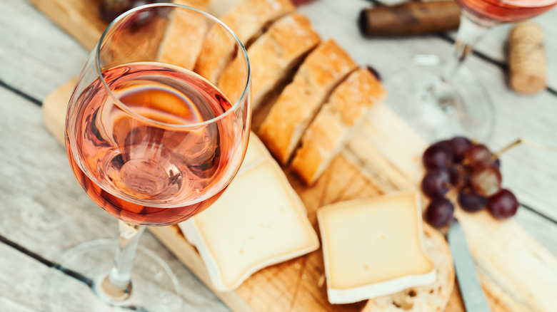 Dinner table with cheese and rosé wine