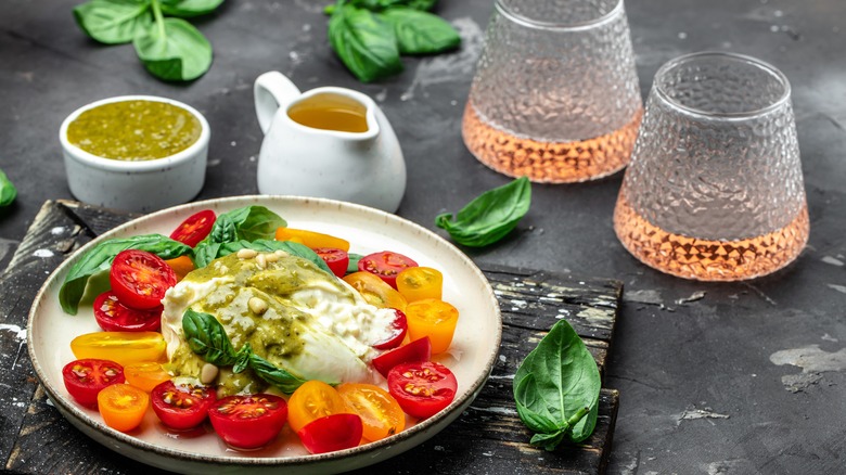 Burrata with cherry tomatoes served with rose wine