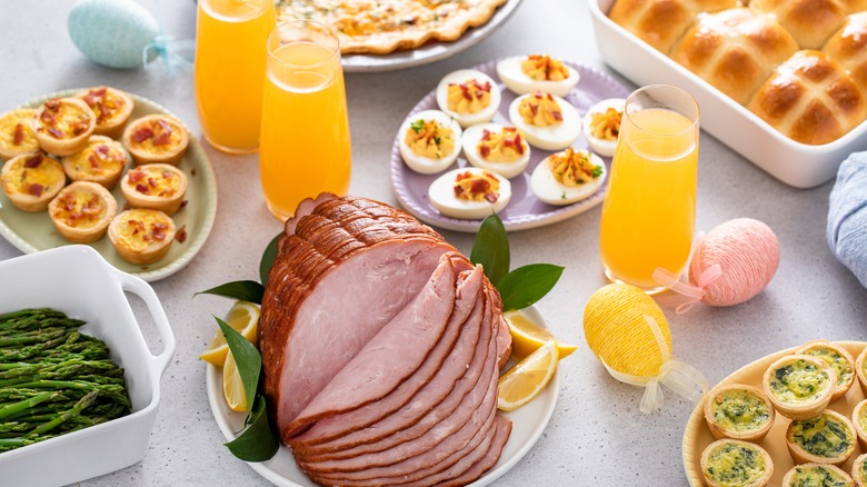Easter brunch with ham, mini quiches, and deviled eggs