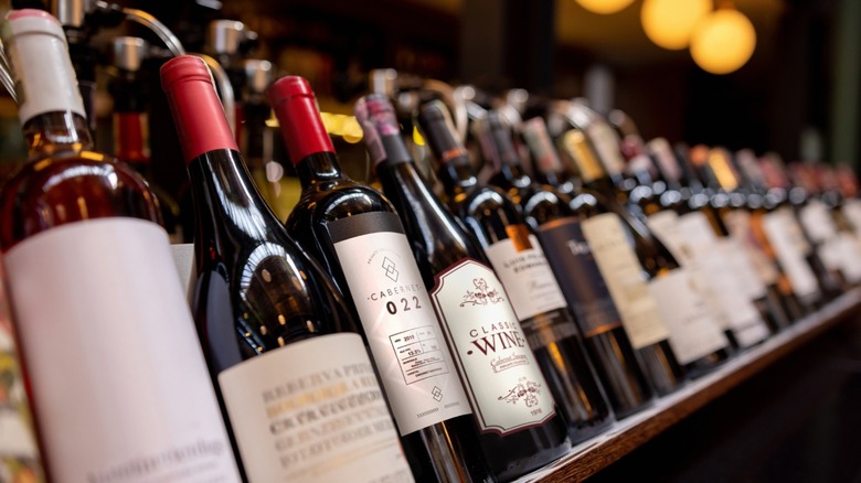 Bottles of wine on display on a shelf 