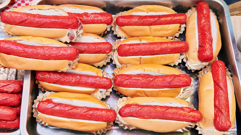 A tray of red Filipino hot dogs
