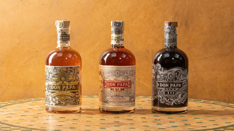 Rum bottles on earth toned background