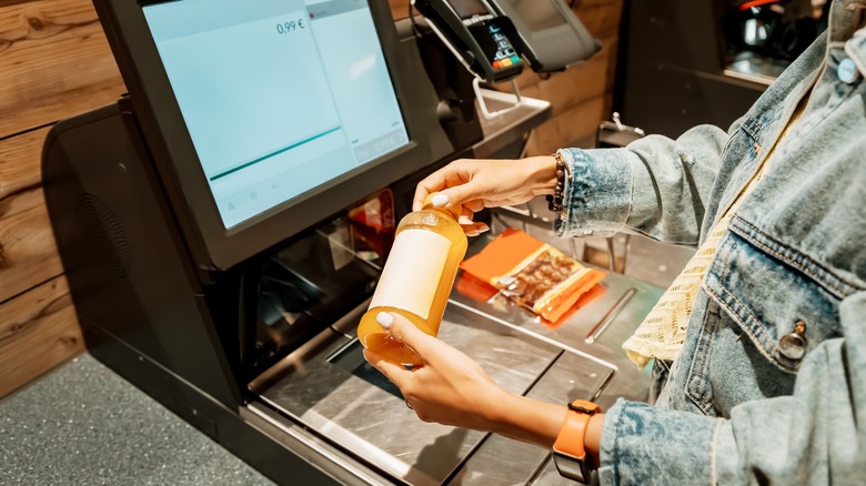 Using self-checkout kiosk