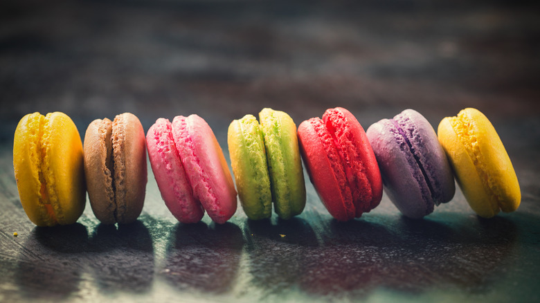 Colorful French macarons in a line