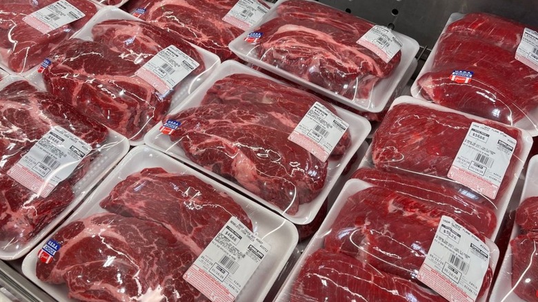 Meat sits in packages in a Costco.