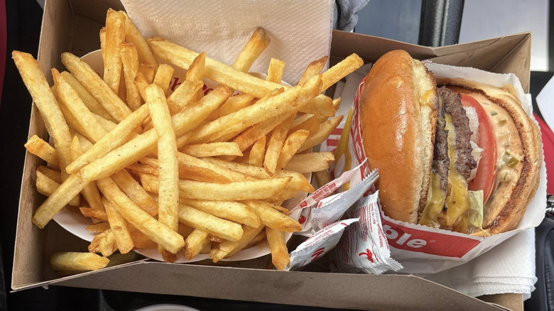 Food from In-N-Out sits in a cardboard tray