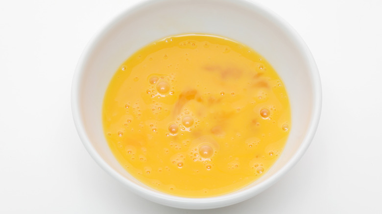 Beaten eggs in bowl