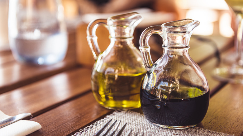 Bottles of olive oil and vinegar.