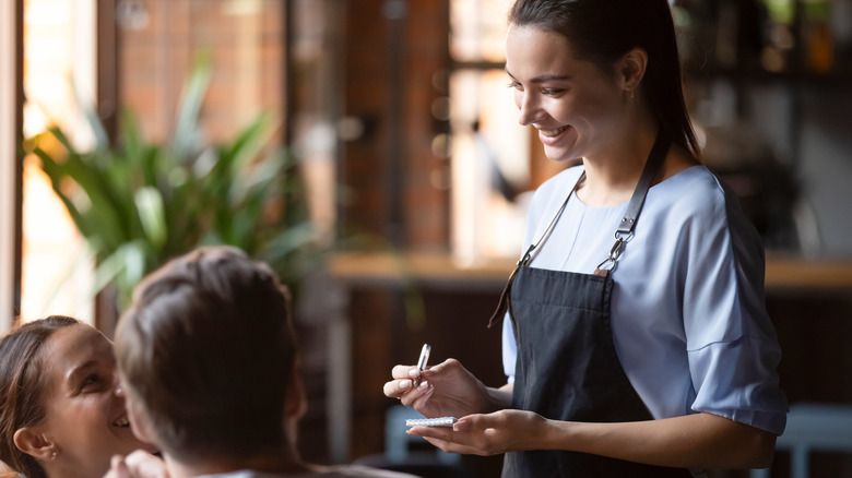 Server taking order at restaurant
