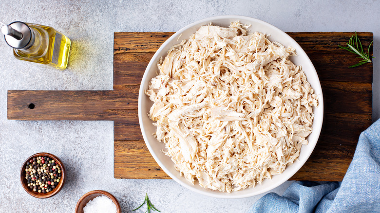 Large bowl of shredded chicken