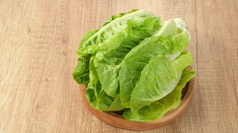 A bowl of lettuce.