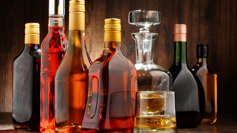Line of liquor bottles on a shelf 