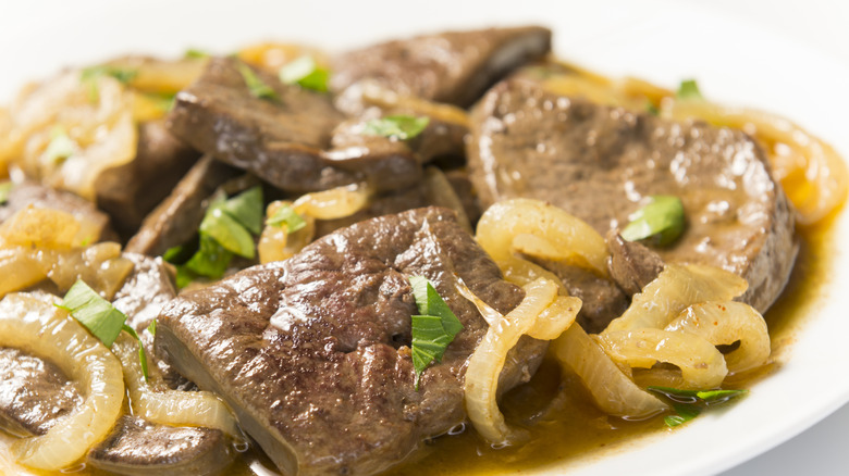 a plate of liver and onions.