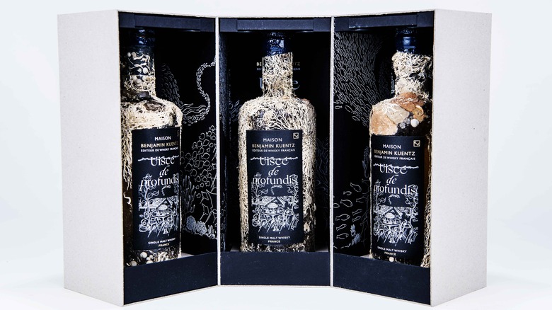 bottles of underwater aged whiskey