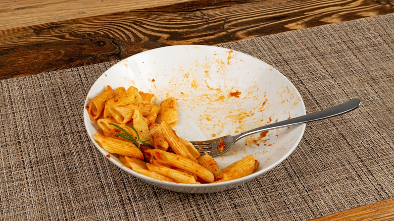 Half-eaten plate of food