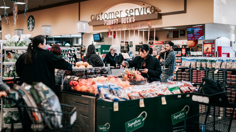 Customers shopping at Safeway