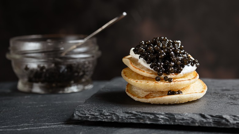 Beluga caviar on blinis