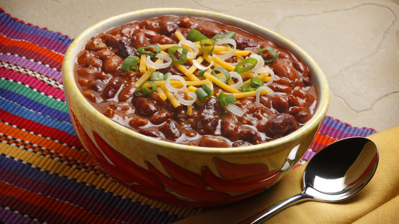 bowl of chili with spoon