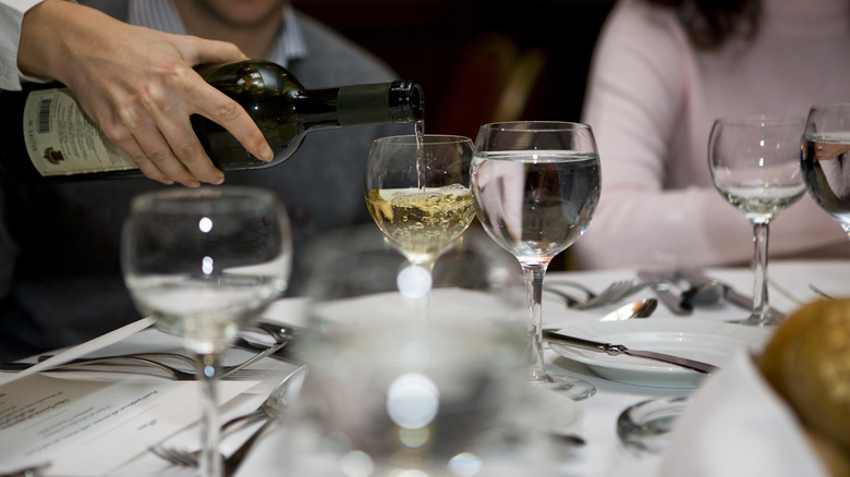 Diners with water and wine