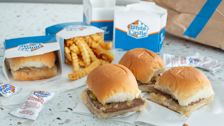 White Castle sliders with fries and ketchup.