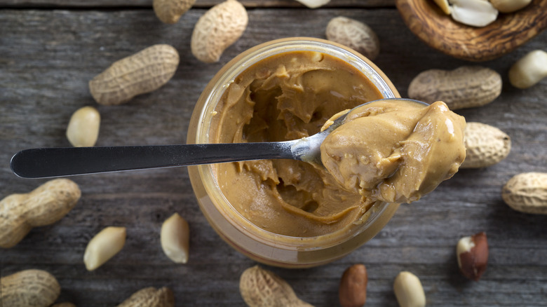 peanut butter jar with spoon