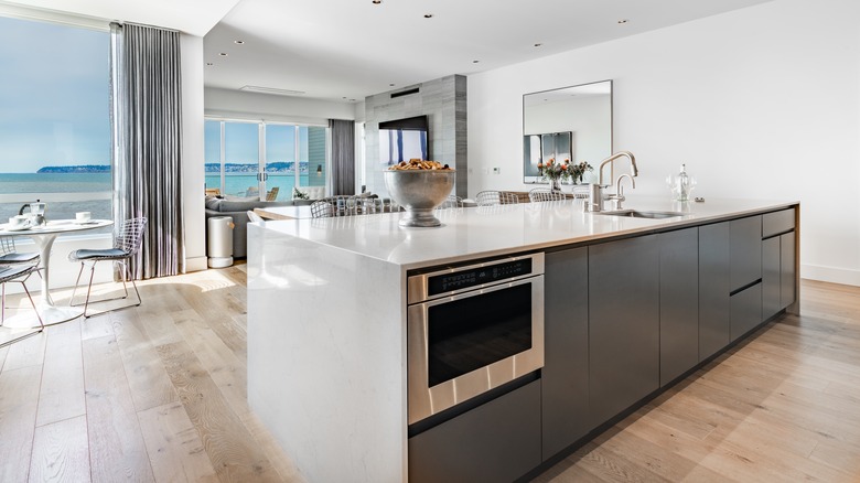 quartz kitchen island countertop in a kitchen with an ocean view
