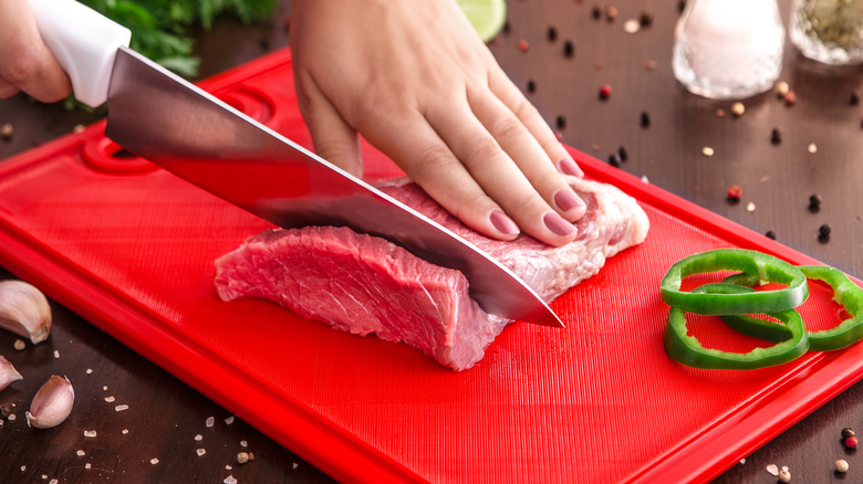 Raw meat on cutting board