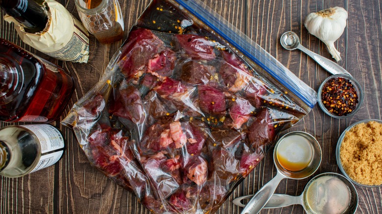 beef marinating in zip-top bag