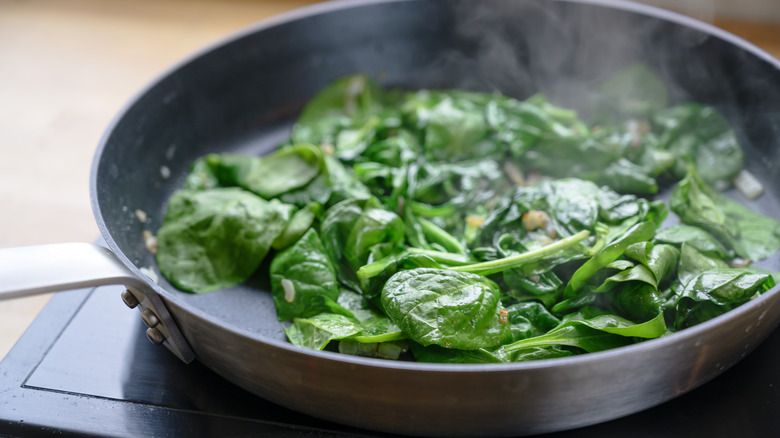 Spinach cooking in pan