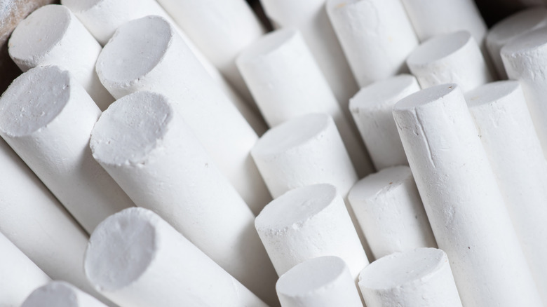 A pile of white chalk sticks