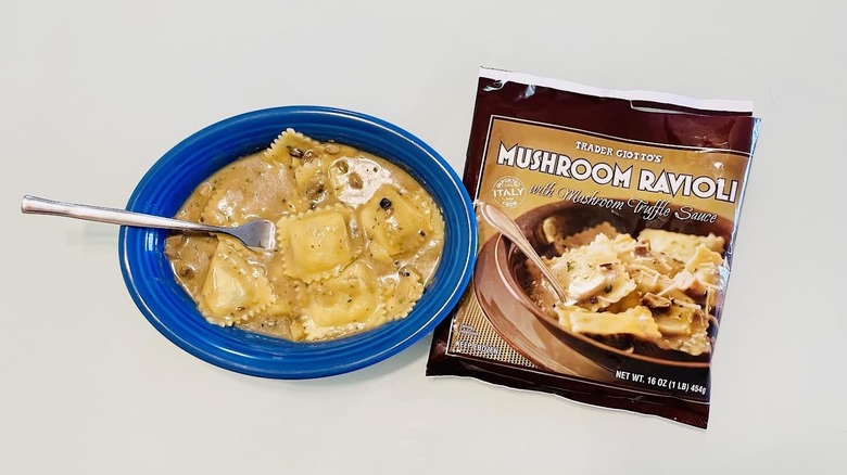 Trader Giotto's Mushroom Ravioli with Mushroom Truffle Sauce in a blue bowl