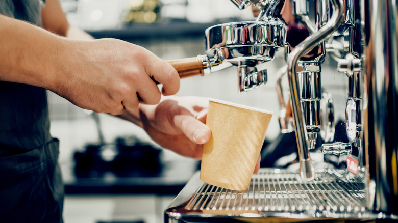 Barista making coffee