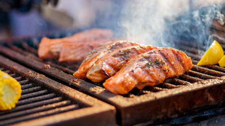 Salmon rolled on a grill