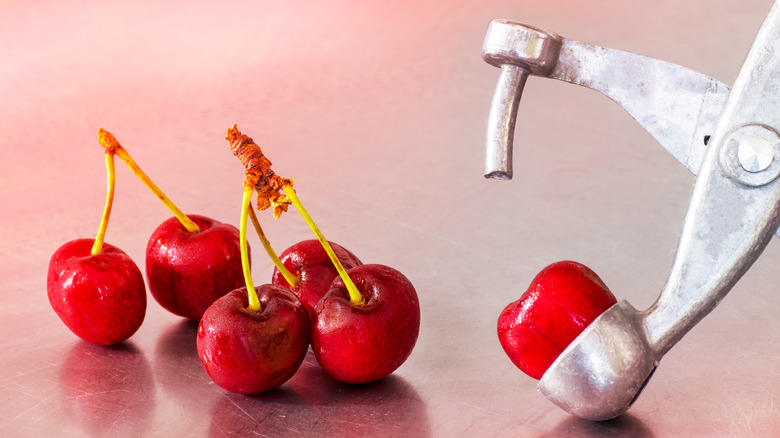 Cherry pitter and cheries