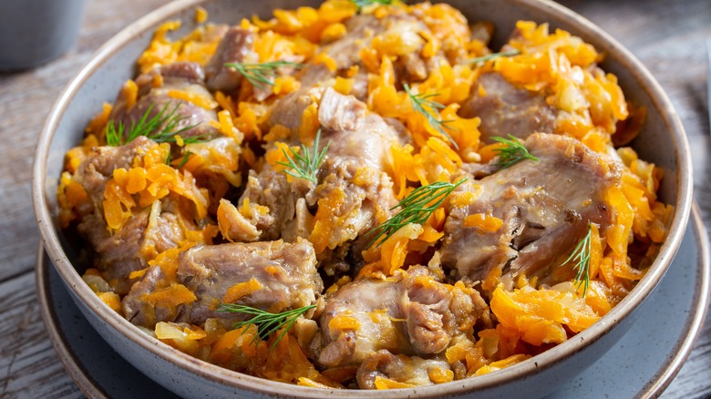 turkey neck meat in a cooked stew