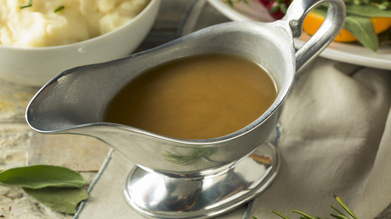 turkey gravy in a silver boat