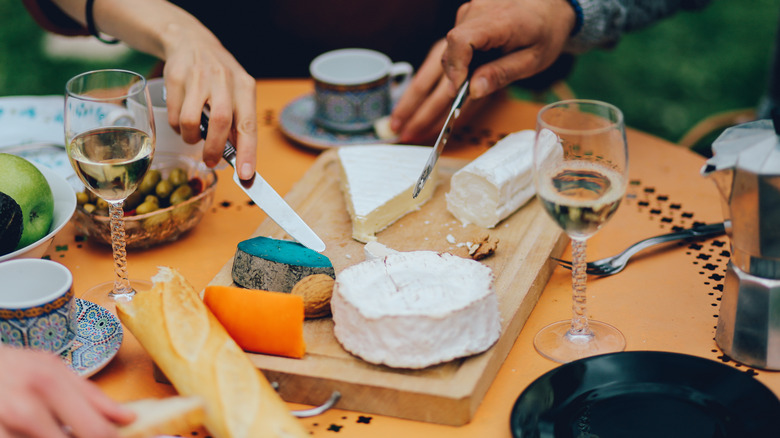 Brie at a dinner table