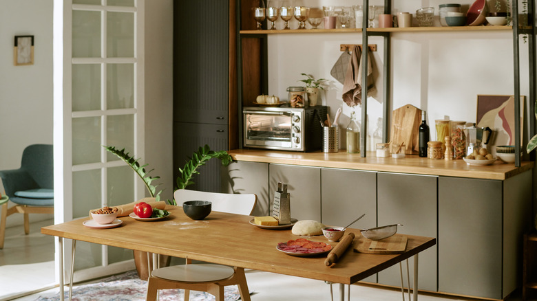 Why Your Kitchen Could Use A Laundry Hamper (It's Cuter Than It Sounds)