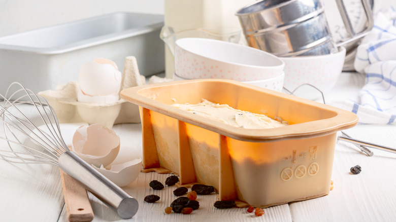Baking supplies next to a silicone mold
