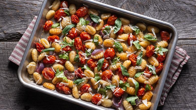 Sheet pan full of veggies and gnocchi