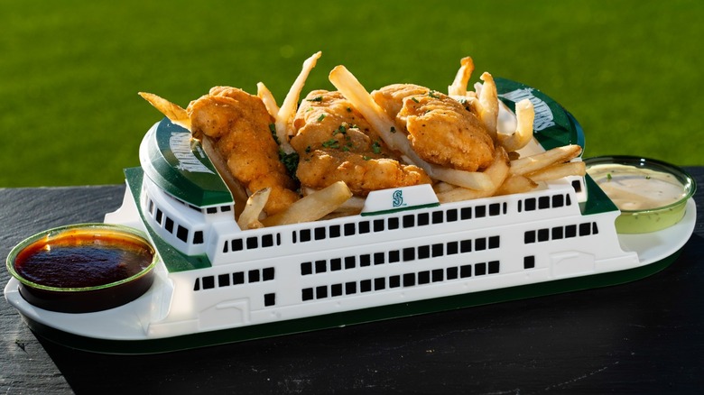 Souvenir ferry boat filled with chicken tenders and fries