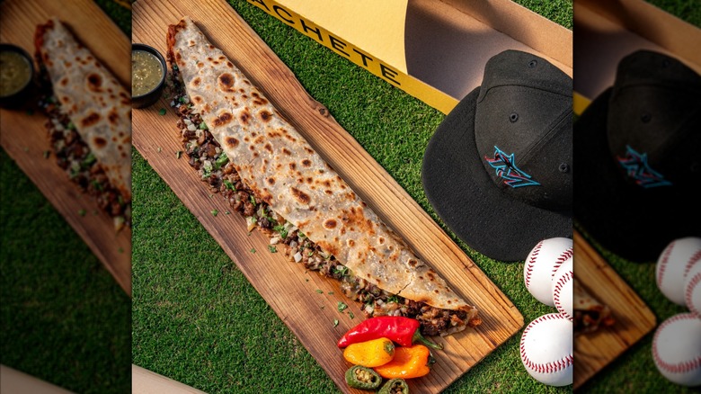 Two-foot long Machete quesadilla on wooden slab