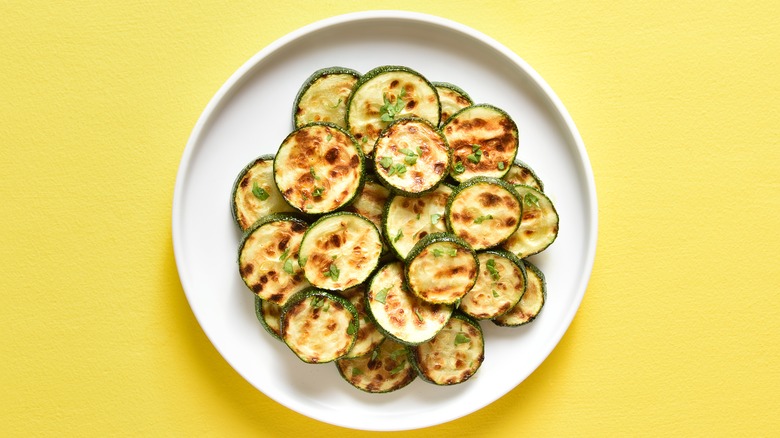 roasted zucchini on white plate
