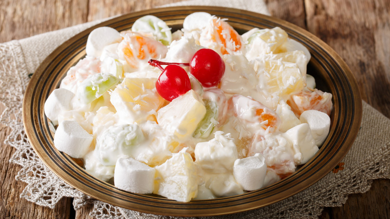 a bowl of ambrosia salad on a vintage napkin