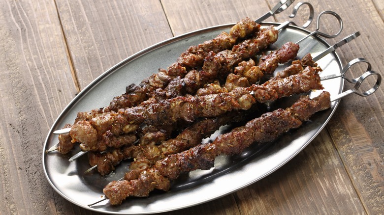 Plate of chinese lamb skewers