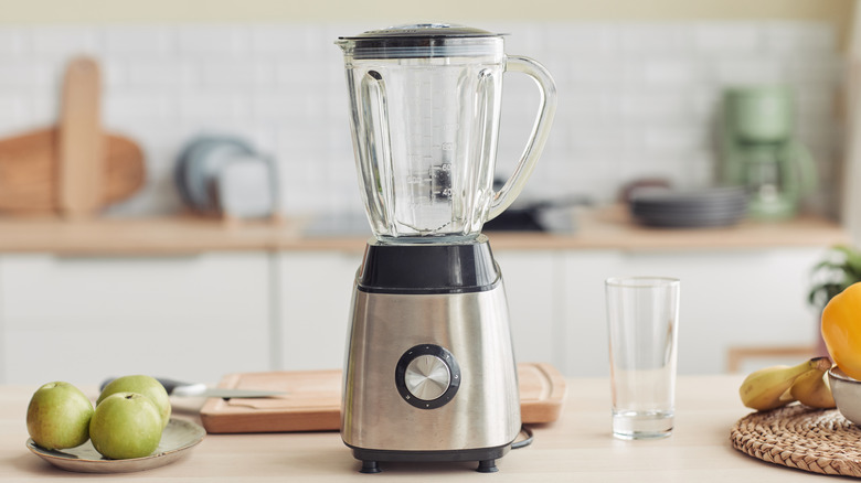 Clean blender in kitchen