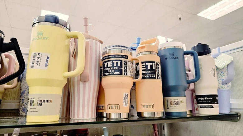 Stanley and Yeti water bottles on a shelf