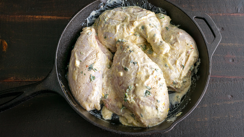 Chicken pieces marinating in yogurt