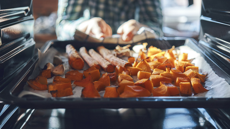 Roasted squash and carrots in oven