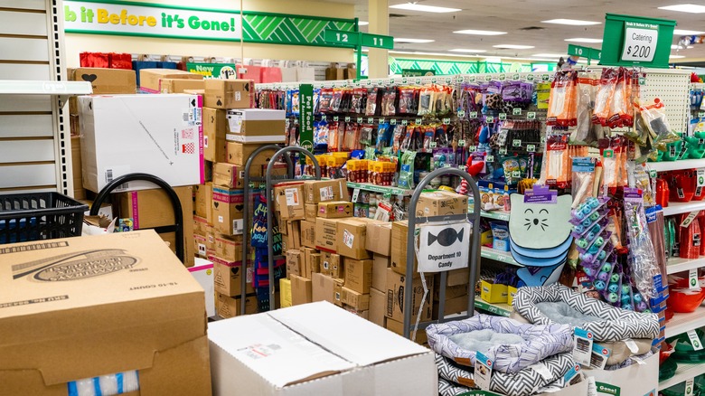 Dollar Tree aisle with shipping boxes